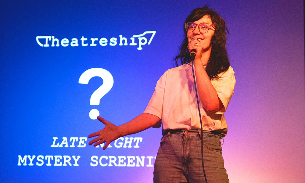 Natalie onboard Theatreship introducing Mystery Cinema